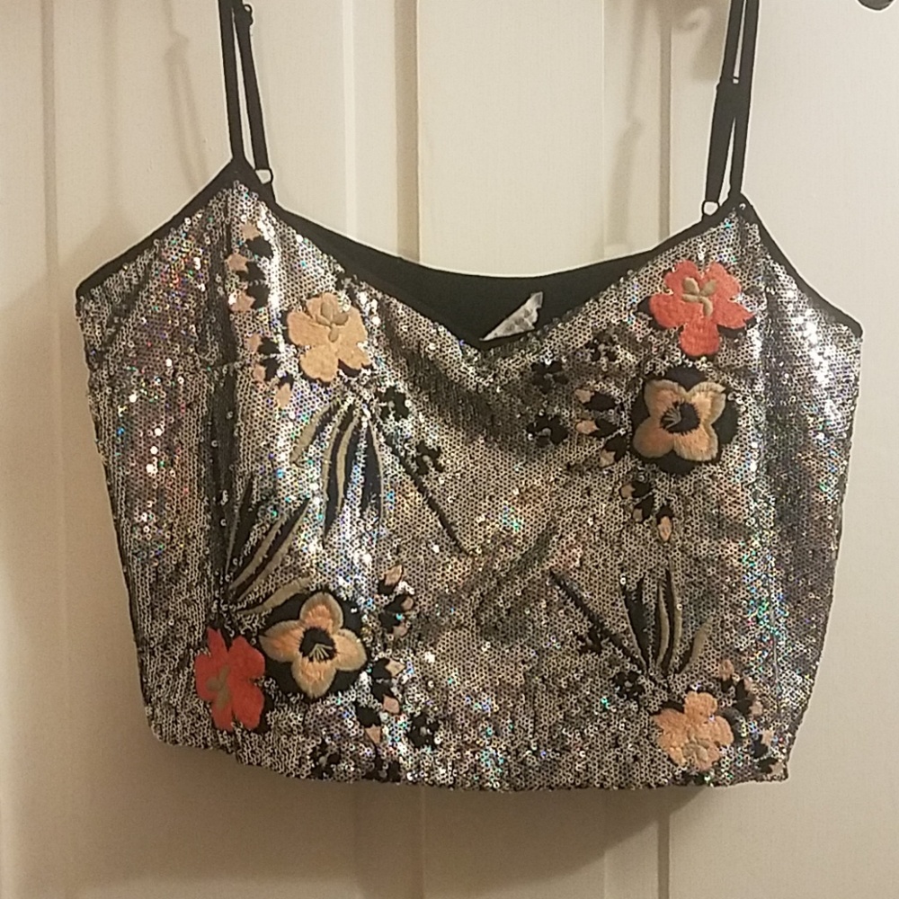 Misses silver sequence crop top.